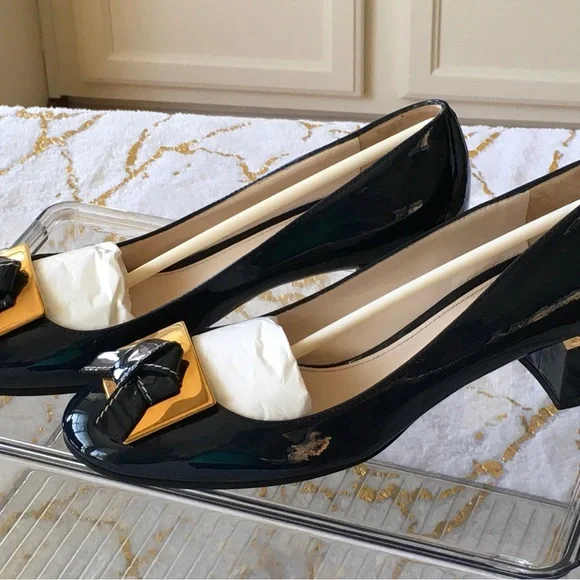 Prada Black and Gold Heels with Elegant Design